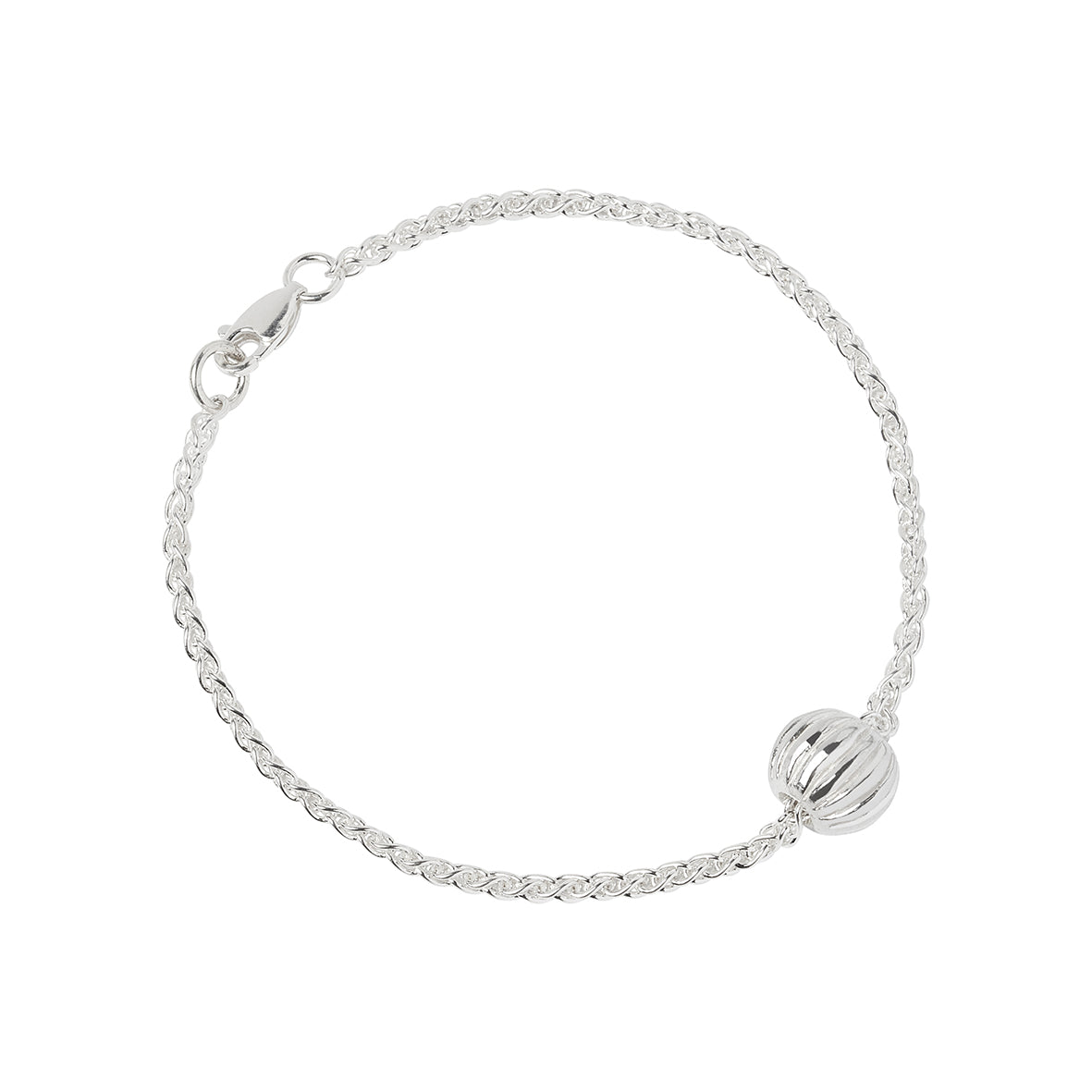 A sterling silver melon bead based on the Roman Melon Beads found at the Roman Sites in Northumberland, the bead is threaded onto a heavy silver spiga chain with a lobster catch on a white background. Handmade in Corbridge