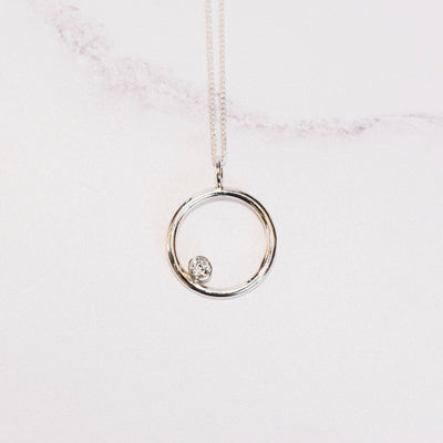 Cubic Zirconia and Silver Circle Birthstone Pendant