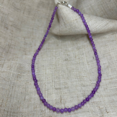 Dyed purple jade bead necklace with silver catch