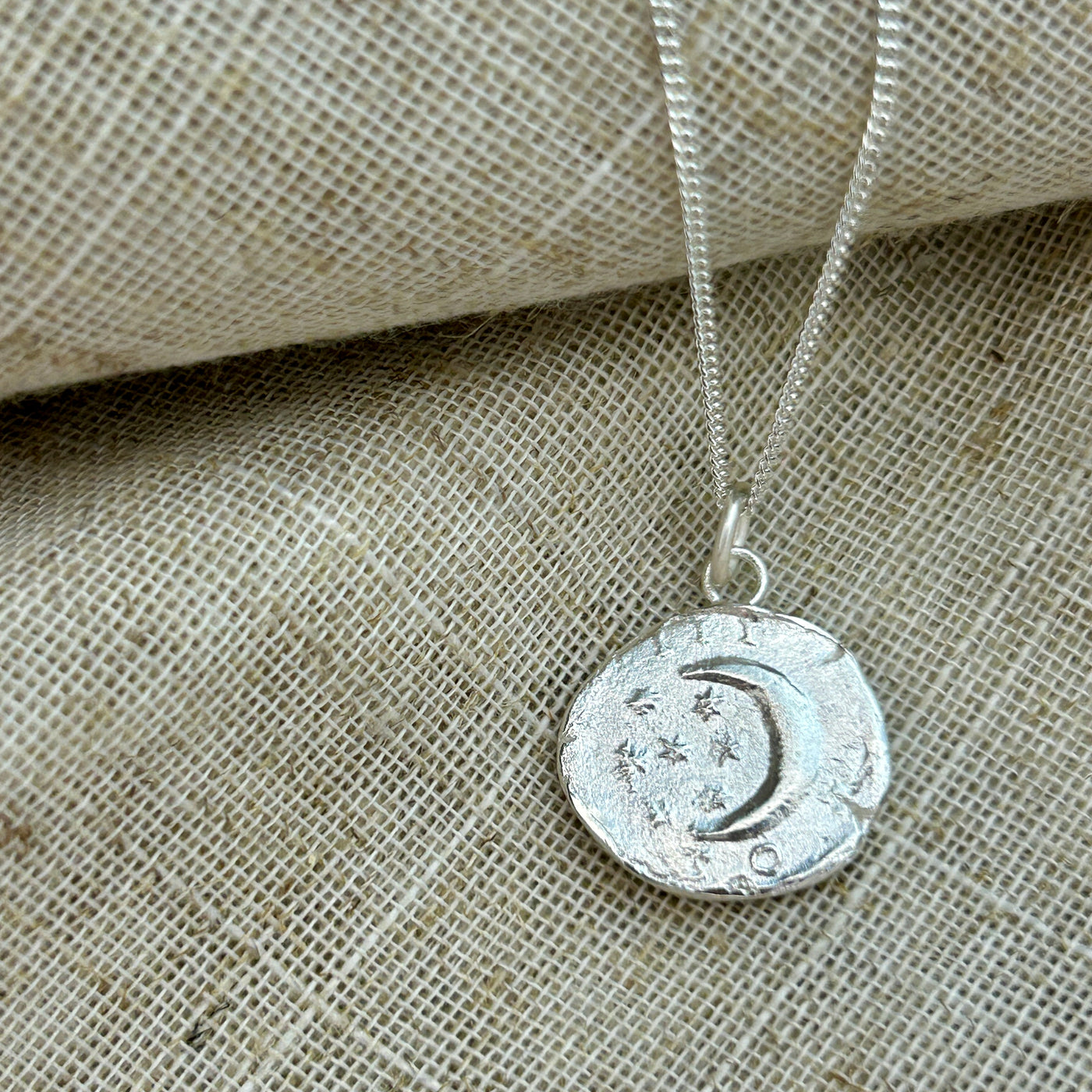 Silver Dark Skies Crescent Moon Coin Pendant