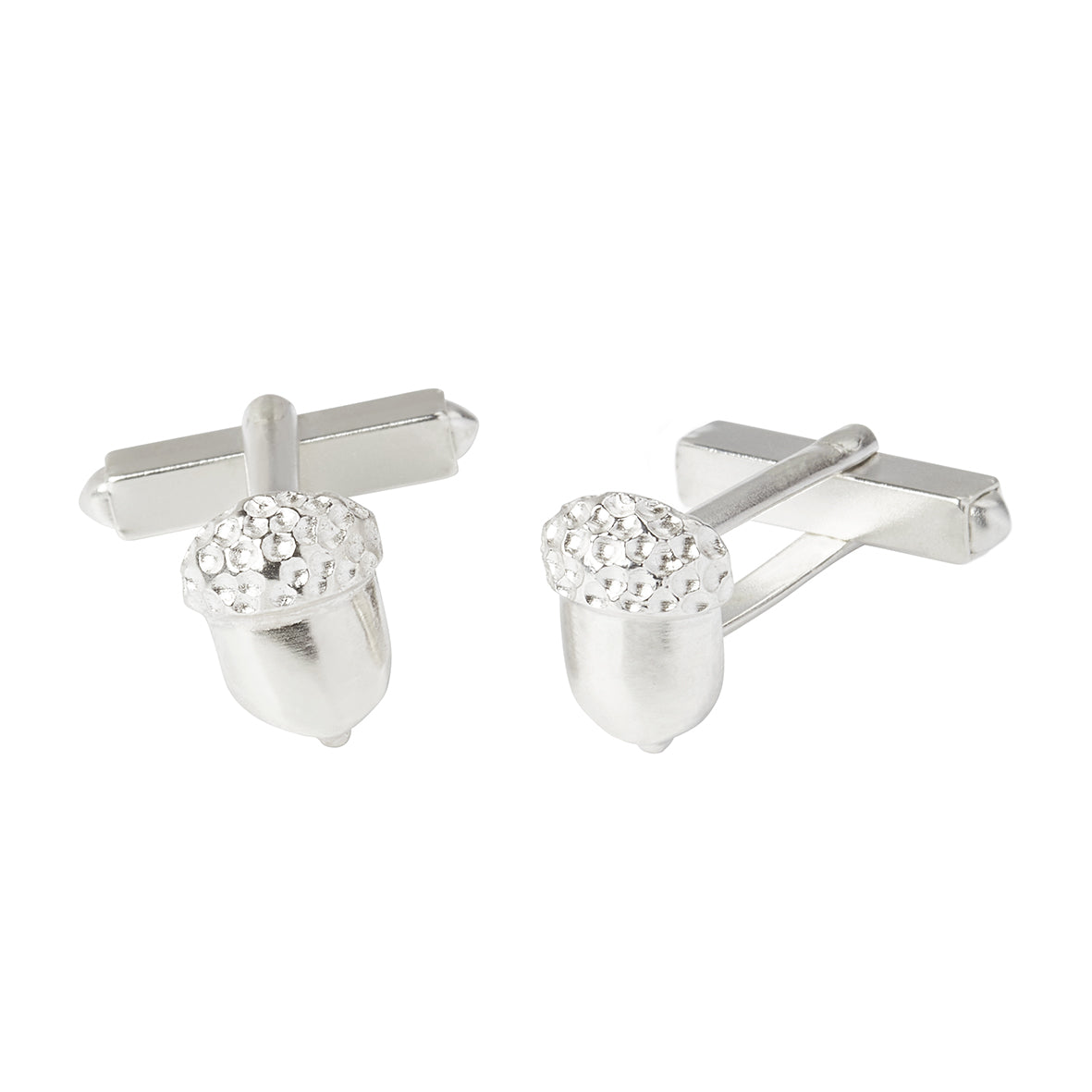 A pair of sterling silver half acorn cufflinks with solid silver swivel cufflink backs on a white background. Handmade in Corbridge Northumberland by Kirsty Taylor Jewellery