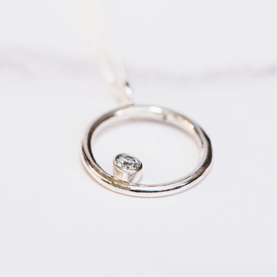 Cubic Zirconia and Silver Circle Birthstone Pendant